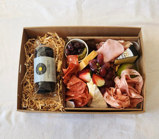 A mouth watering gourmet box of artisan farmhouse cheeses, cured meats sliced in house, fresh seasonal fruits and accompanied with Australian olives, pickles, semi dried tomatoes & much more. Complete crackers. One of our best sellers and only contains Australian produce. This box is designed for just 2 people to share. 